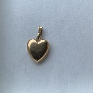 Beautiful 10k gold puffed heart charm/pendant.